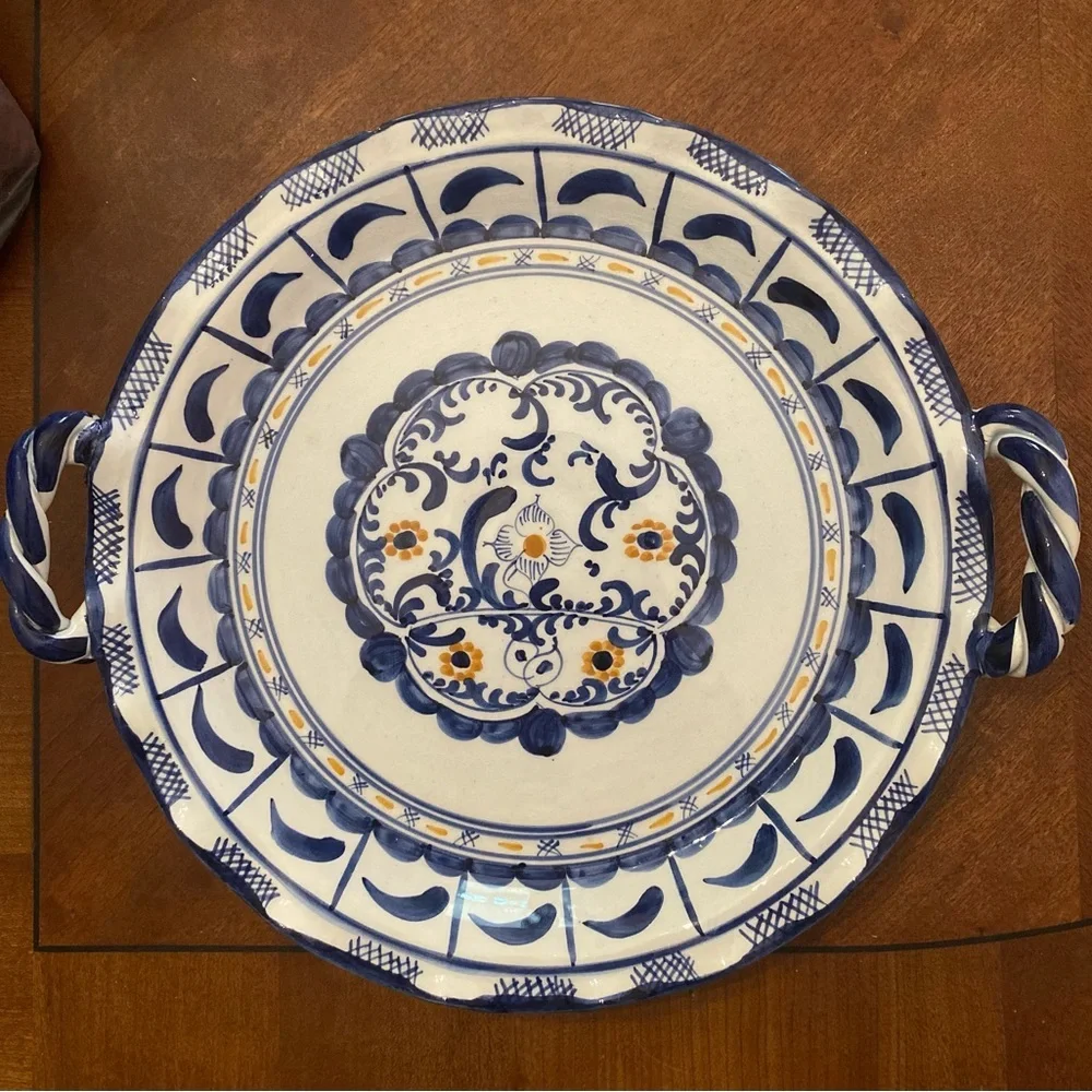 Baking Dish Made in Greece 11.25 inches Wide and the rise is about 1.5 inches‎